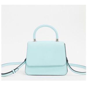 Mini bag with cross body strap in bleached aqua